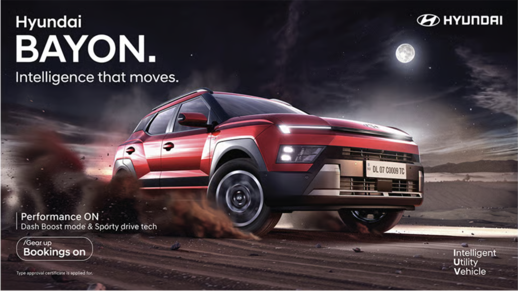 Red Hyundai Bayon kicking up dust on a dirt track